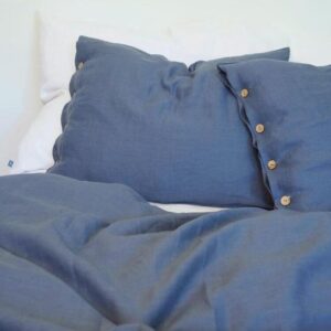 Jak kreatywnie uszyć pościel na guziki, by dodać stylu sypialni?